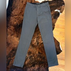 Brand new never worn, Calvin Klein tech fabric chinos. Grey, size 29 waist.